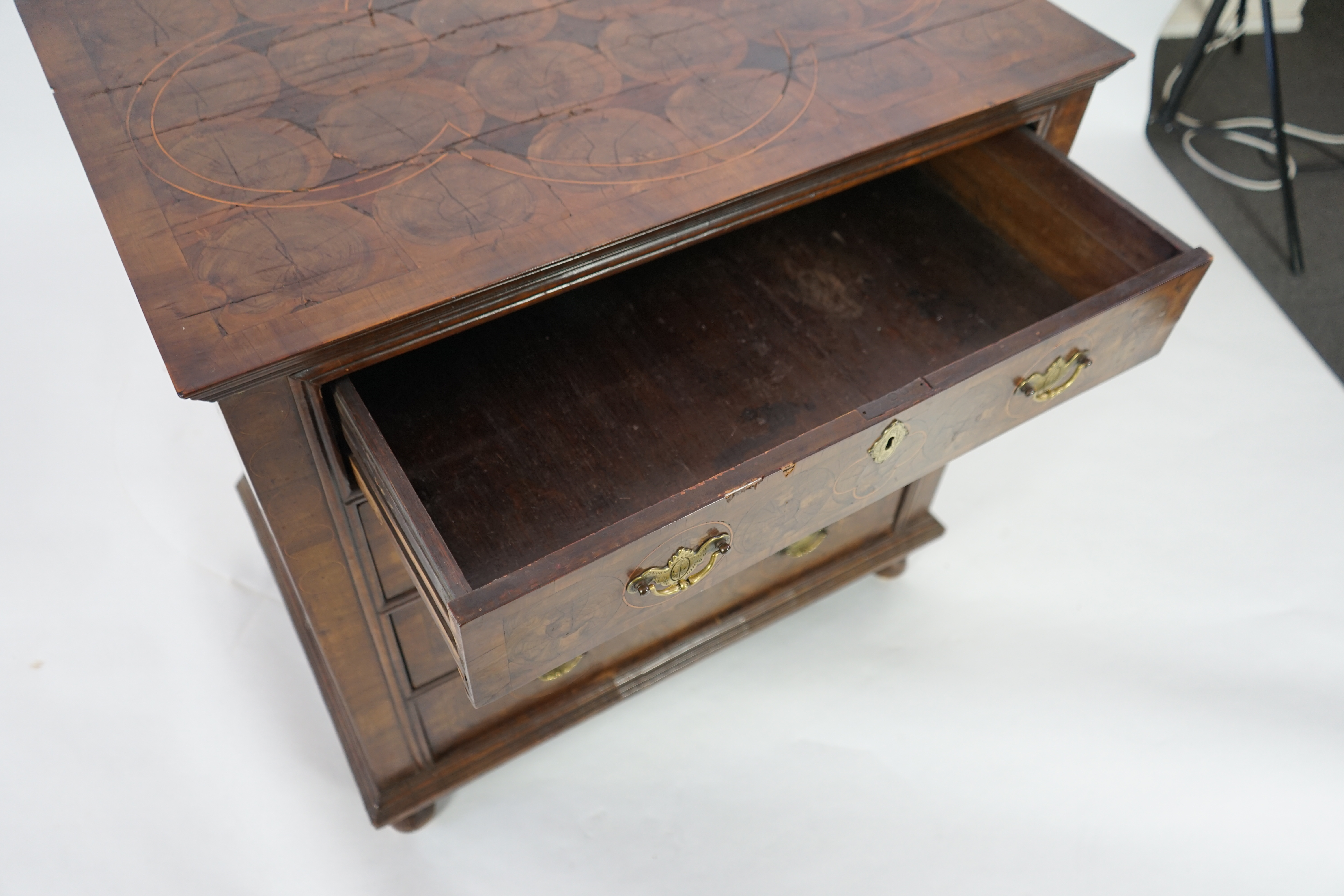 A William and Mary oyster veneered laburnum and walnut chest